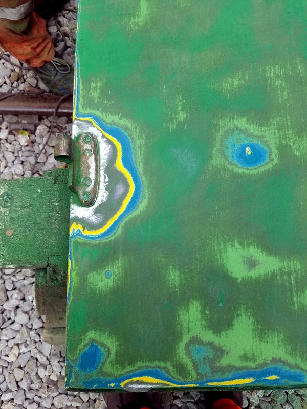 Class 127: Different colours of paint on a sanded door